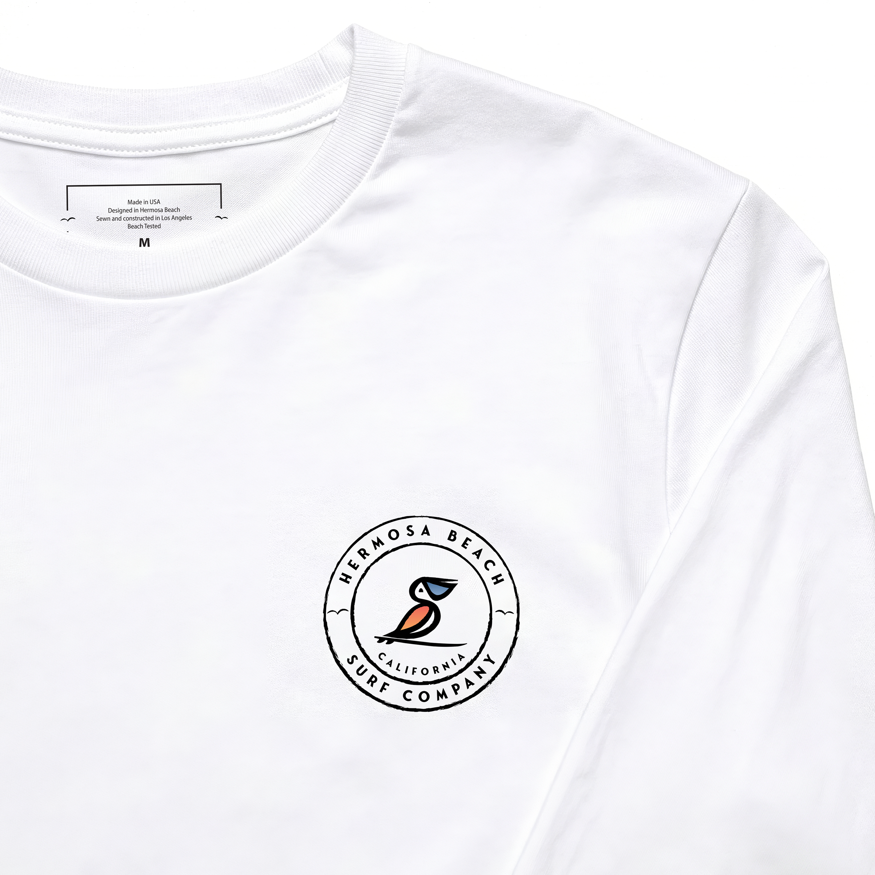 White long-sleeve shirt with a logo on the chest against a white background