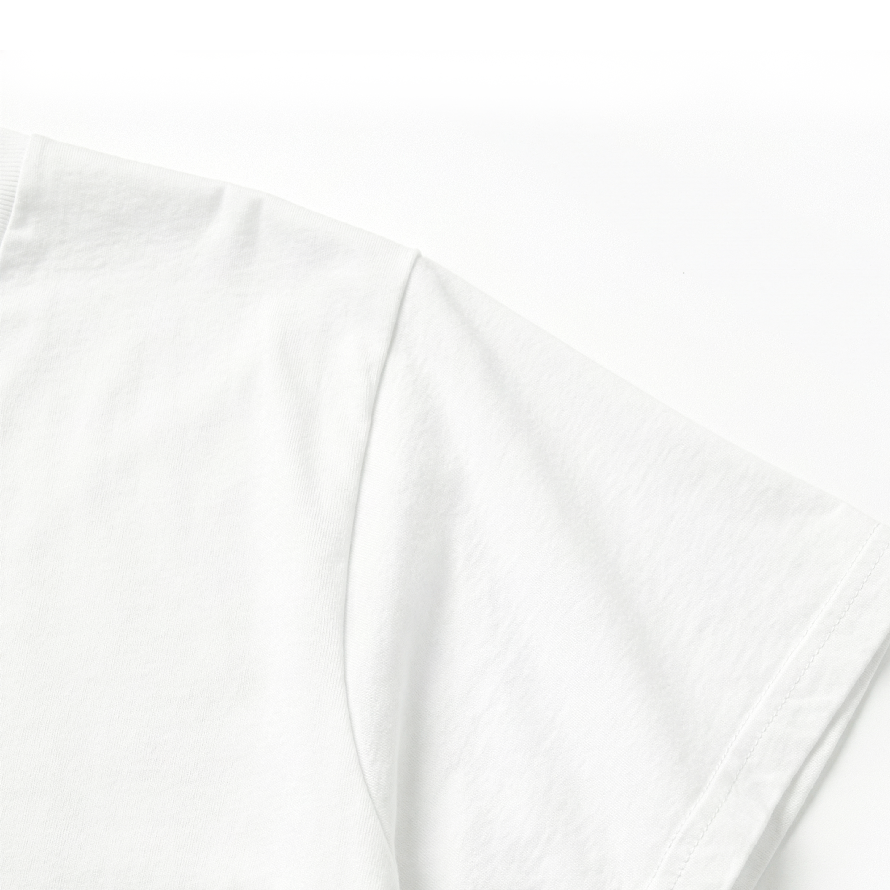 Close-up of a white shirt with a subtle pattern