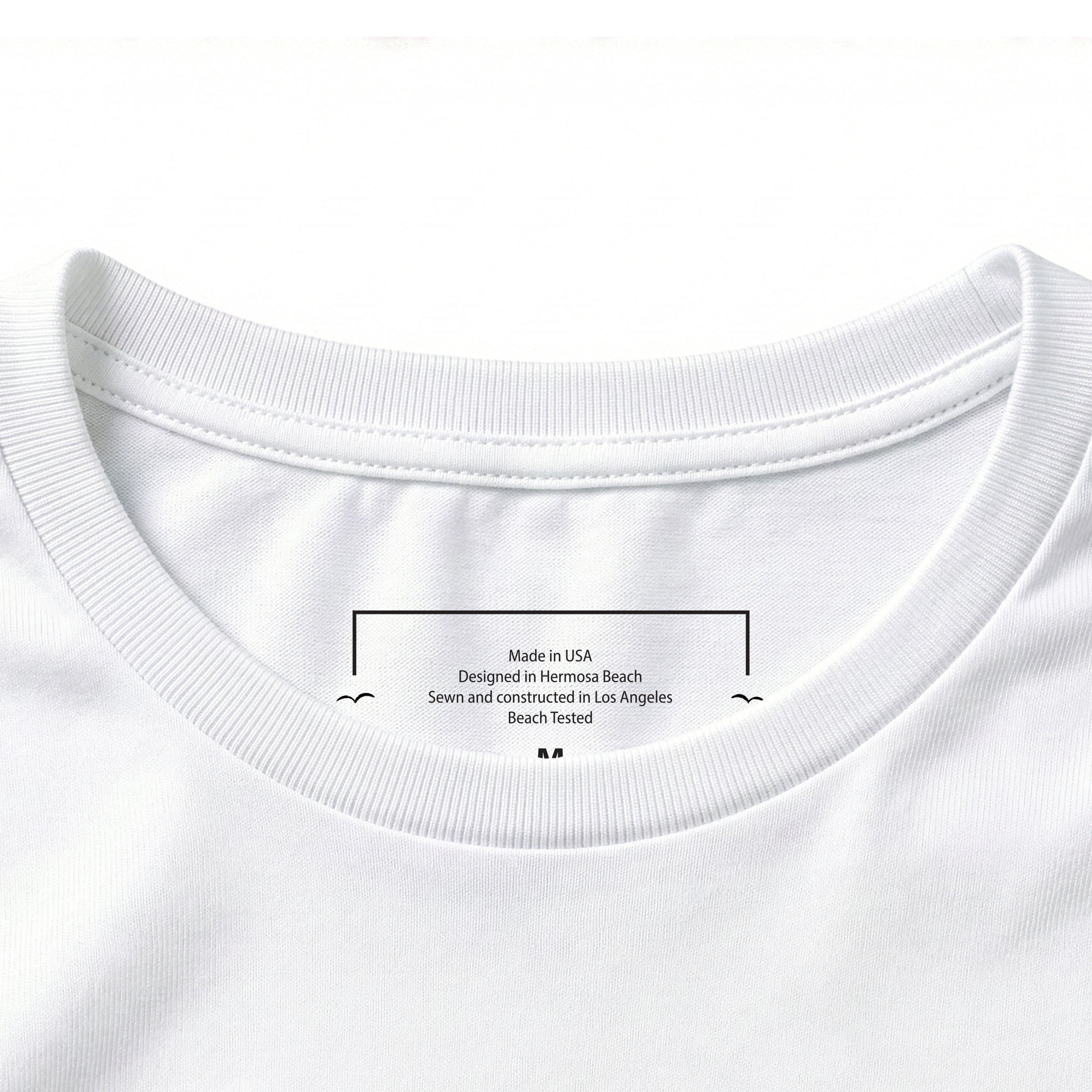 Close-up of a white t-shirt collar with text on a white background