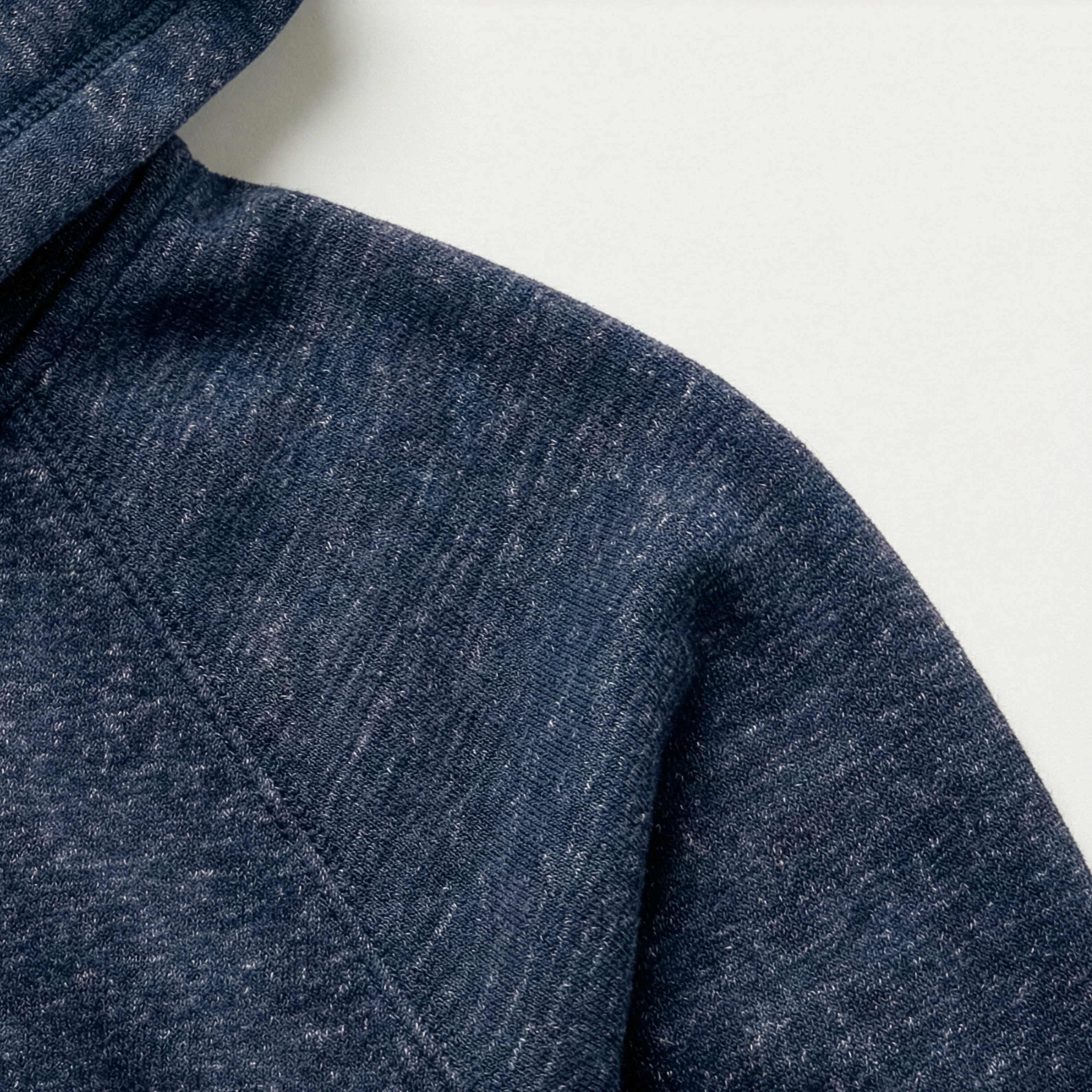 Close-up of a blue textured fabric on a white background