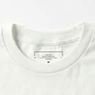 Close-up of a white t-shirt collar with a label on a white background