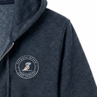 Navy blue jacket with a logo on the chest against a white background