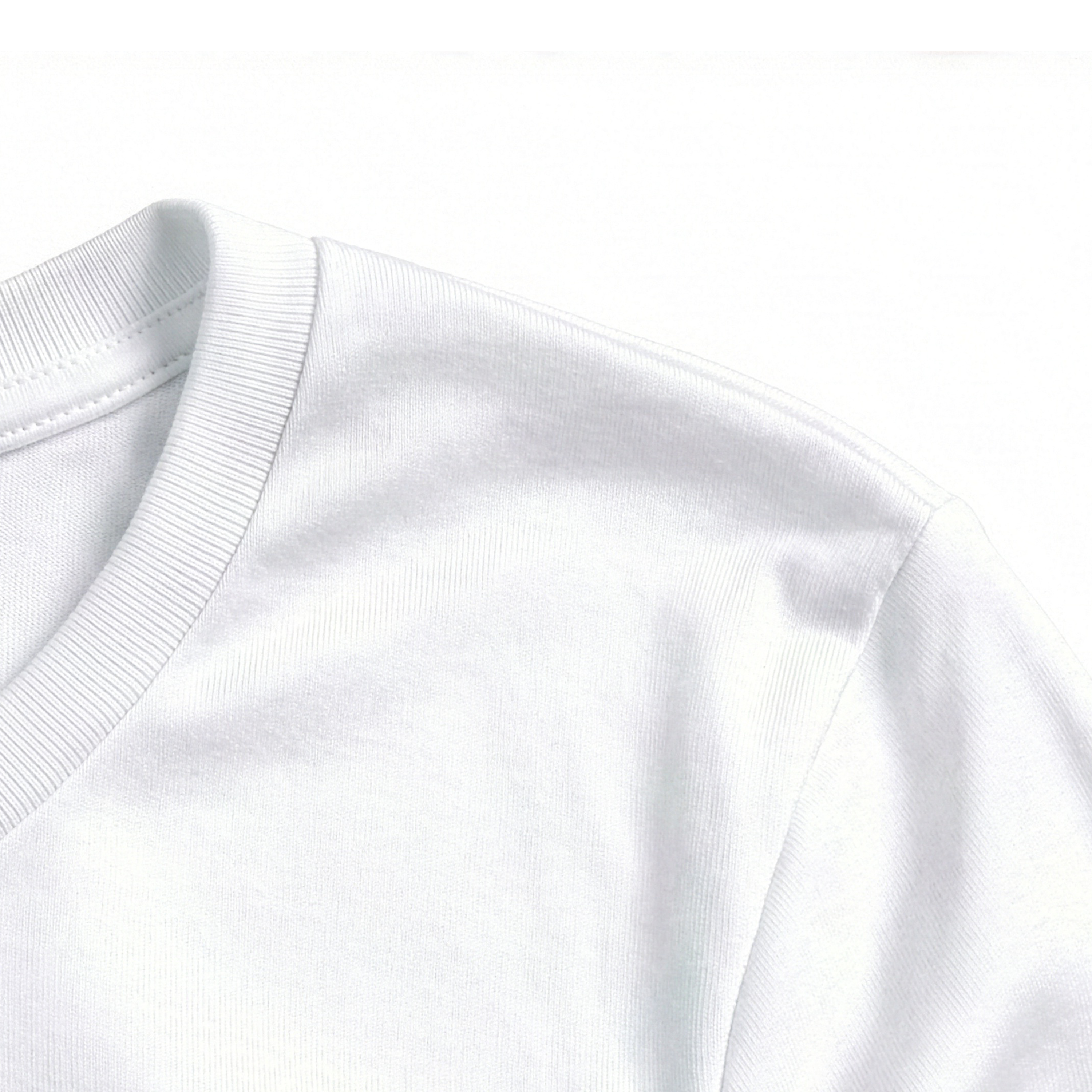 Close-up of a white long sleeve with a focus on the neckline and sleeve.