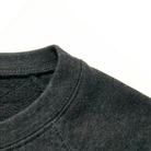 Close-up of a grey fabric texture on a white background