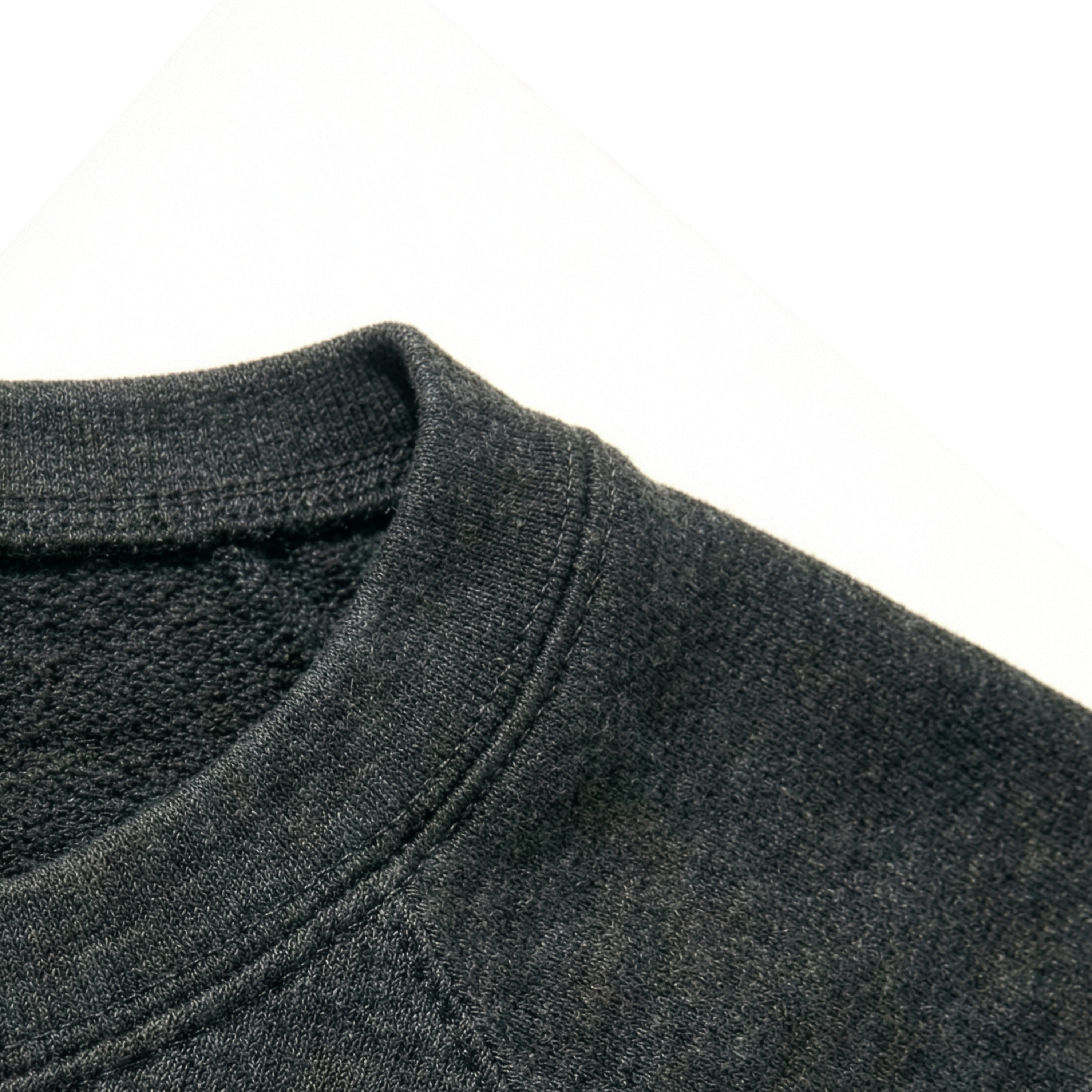 Close-up of a grey fabric texture on a white background