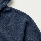 Close-up of a blue textured fabric on a white background